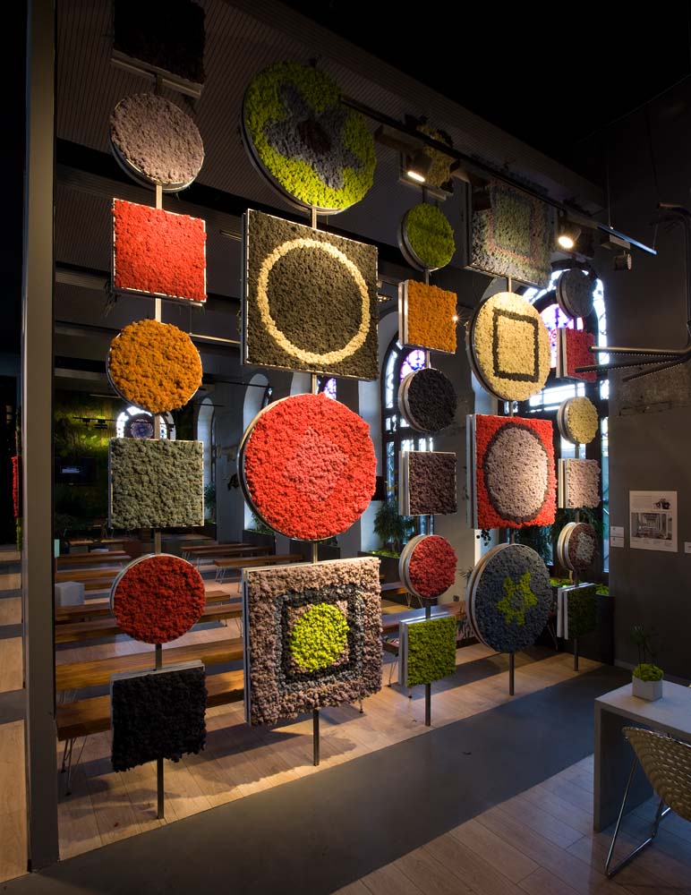 This display at the Madrid design firm "Casa Decor" shows off the color versatility of moss wall forms.