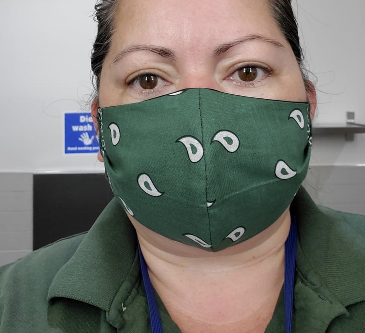 Horticultural technician Sophie Gonzalez hard at work wearing the new custom mask she designed!