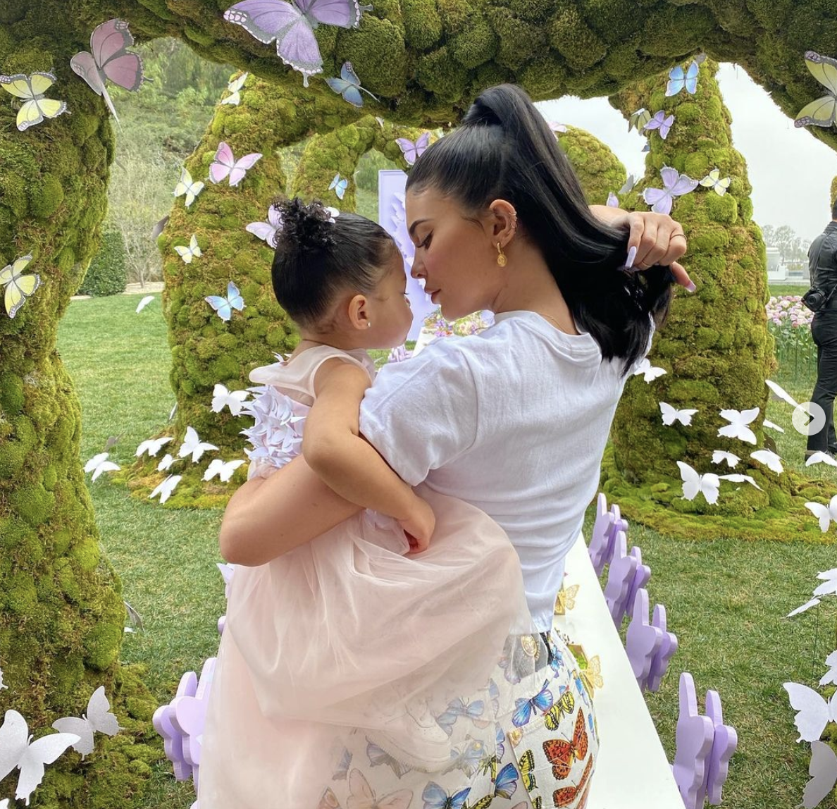 Kylie Jenner and daughter Stormi in their garden. 