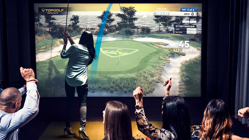 Want to play golf at the office? it's one of the new return to office incentives. Photo: Courtesy TopGolf