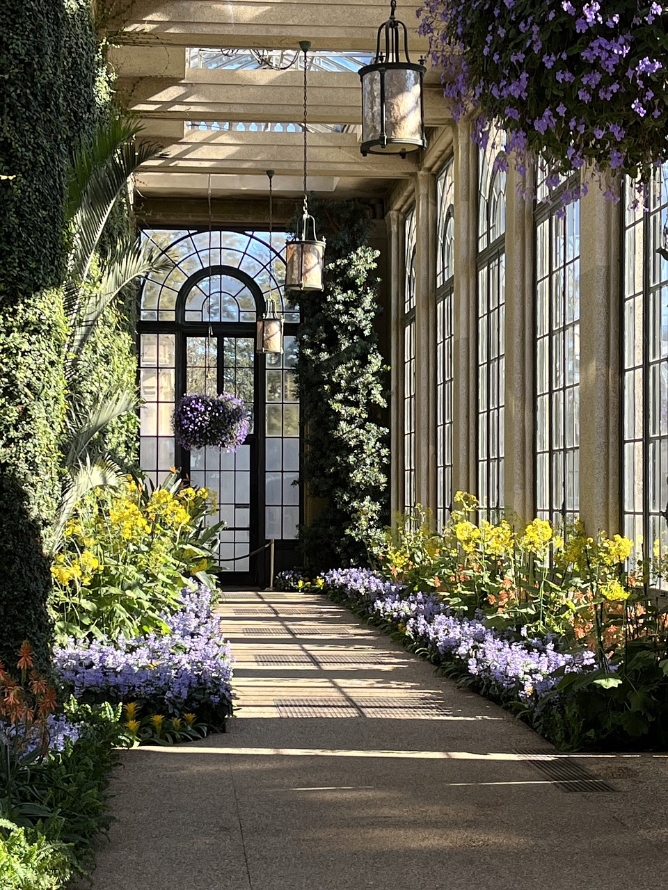 You may not have the luxury of a beautiful conservatory like this, but you can find indoor spaces with light and warmth for your indoor plants this winter. Photo: Rick Cross winter months