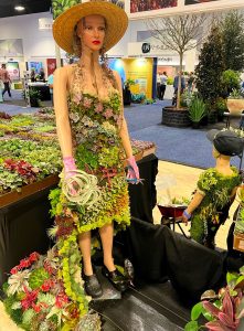 Lady in a succulent dress at TPIE 2023