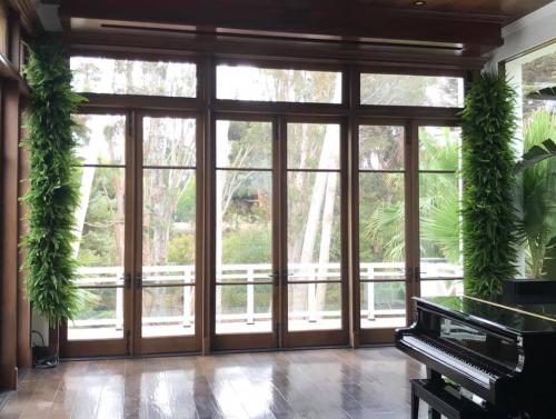 The addition of the two living walls elevated the look of this spectacular music room in the client's Malibu home.