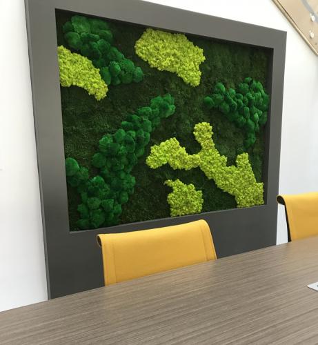 Close-up view of the office's new moss wall in the lobby.